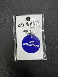 ABOUT FACE NOVELTIES: 2D - ABOUT FACE KEY TAGS - LOW EXPECTATIONS - 186851**