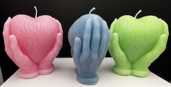 SUE'S CANDLES: SJ - HEART IN HAND CANDLE - ASSORTED COLOURS - PACKAGED - SJ-HH**